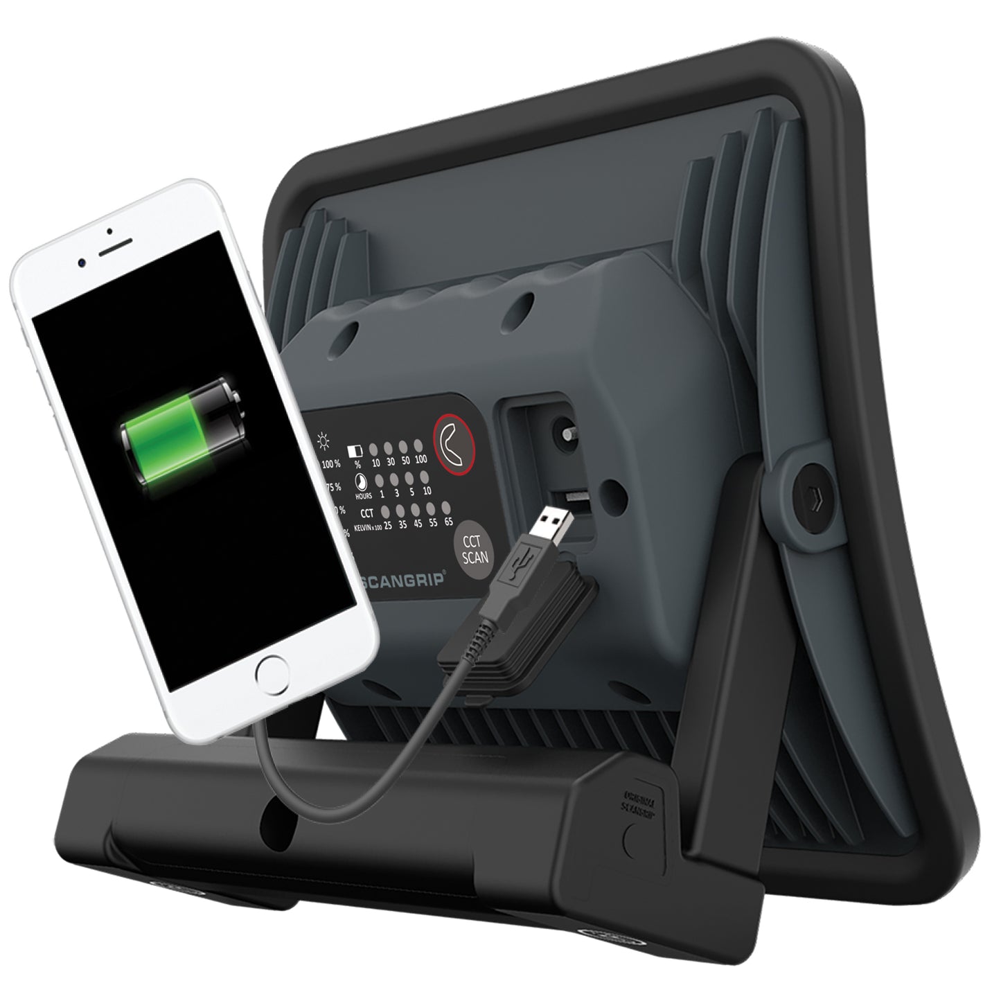 Product photo of a dark gray SCANGRIP work light on an isolated white background powering a white smartphone displaying a green charging battery icon, with visible USB port and control panel showing brightness percentages and CCT Kelvin settings