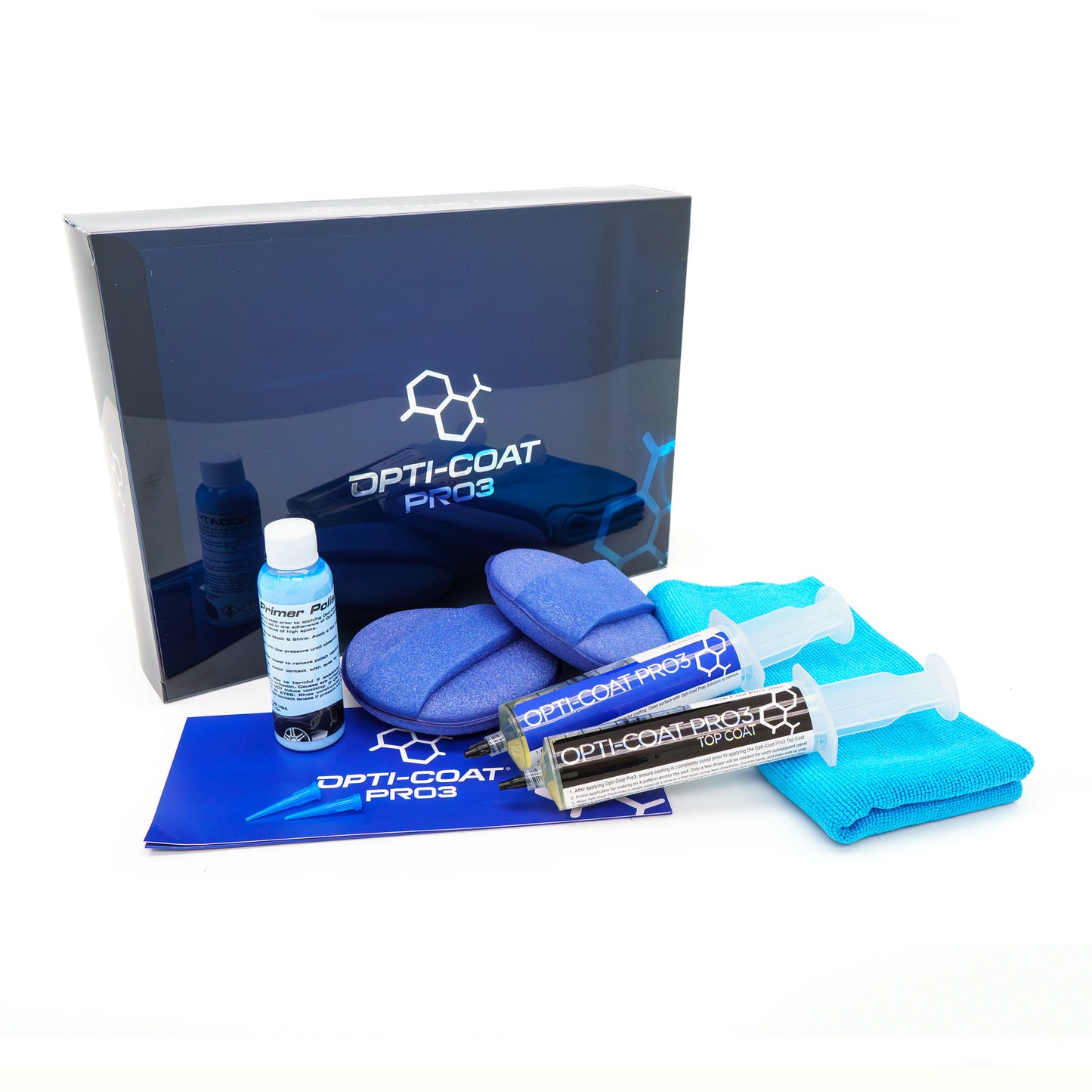 Opti-Coat Pro3 ceramic car coating kit on a white studio background featuring a dark blue product box, light blue primer polish bottle, two blue foam applicators, two syringe-style Opti-Coat Pro3 applicators, and a light blue microfiber towel