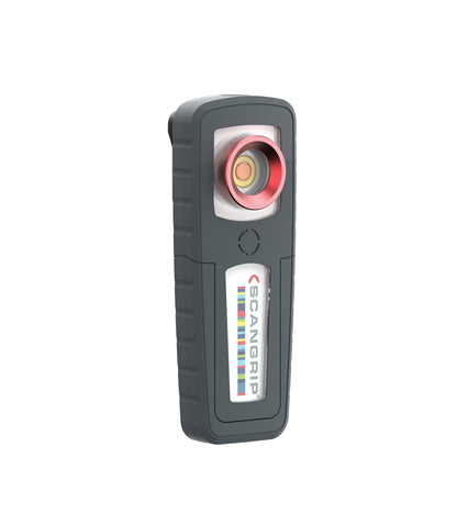 Digital render of a dark grey Scangrip work light on a white background, featuring a prominent red ring around the lens, a yellow central light element, and a vertical Scangrip logo with colorful stripes
