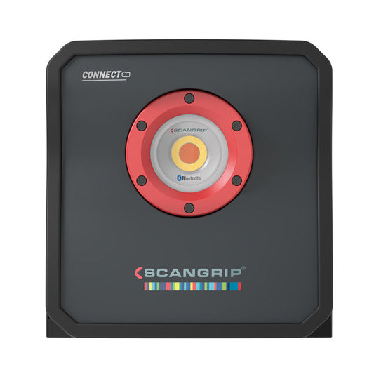 Product photo of a dark grey Scangrip CONNECT portable work light on a white background, distinguished by its central red ring, yellow LED element, blue Bluetooth logo, and a colorful rainbow bar below the Scangrip brand