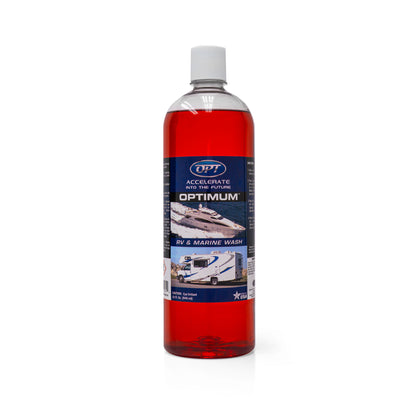 A clear plastic bottle of Optimum RV & Marine Wash containing bright red liquid with a dark blue label showing a white speedboat and an RV and a Made in USA star logo