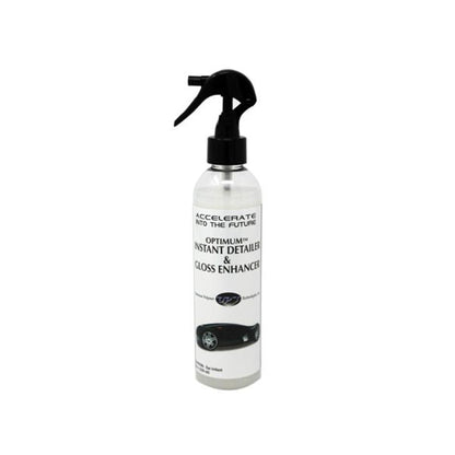Optimum Instant Detailer & Gloss Enhancer in a clear spray bottle with a black trigger top and a label featuring "ACCELERATE INTO THE FUTURE" text and a black stylized car illustration
