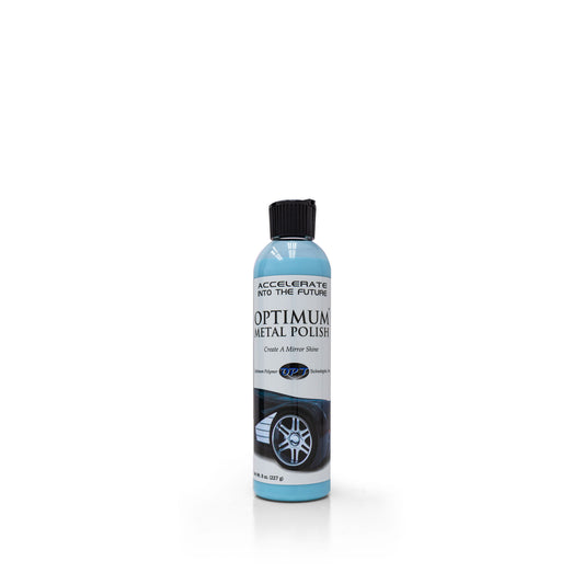 Product photo of a light blue 8 oz bottle of Optimum Metal Polish with a black flip-top cap, its label featuring a shiny car wheel illustration and text reading Create A Mirror Shine