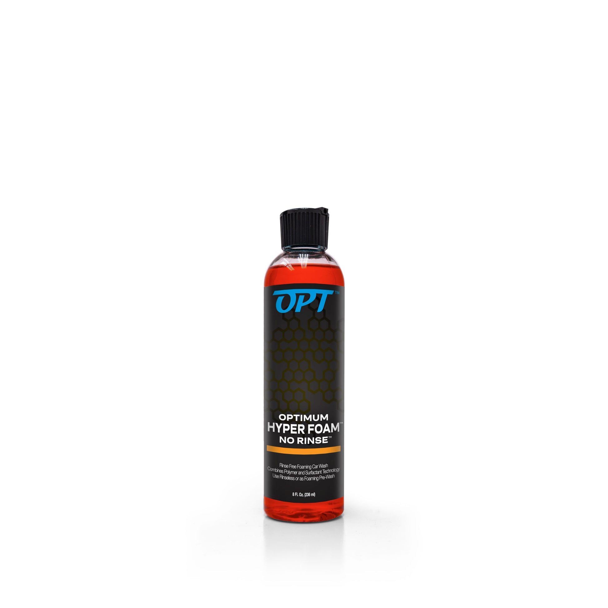 Product Photography of a clear bottle of Optimum Hyper Foam No Rinse car wash containing bright orange liquid, a black label with a blue OPT logo and subtle honeycomb pattern, topped with a black ribbed flip-top cap