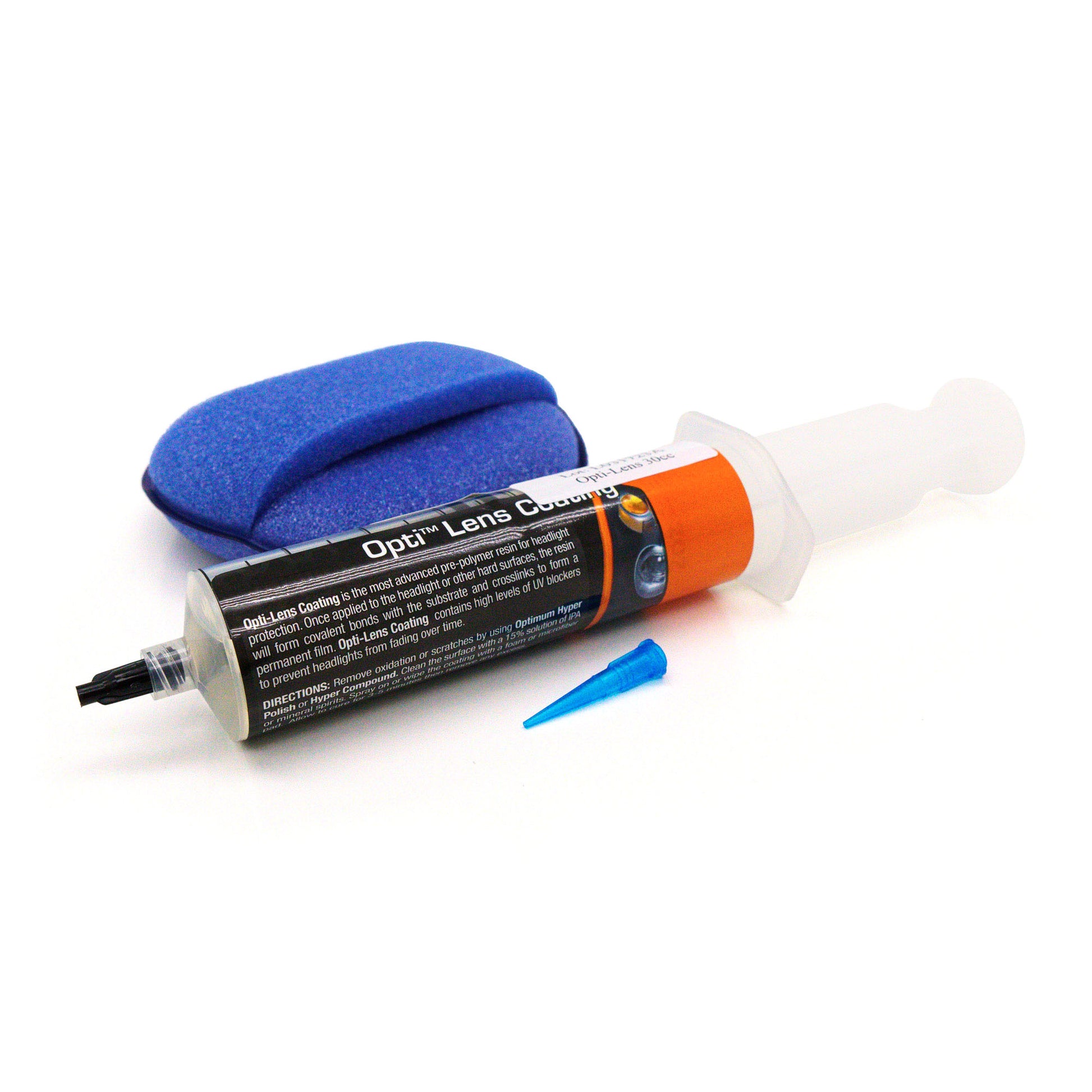 Product photography of an Opti-Lens Coating headlight restoration kit on a white studio background, featuring a black and orange syringe with a white plunger, a bright blue sponge, and a translucent blue applicator tip
