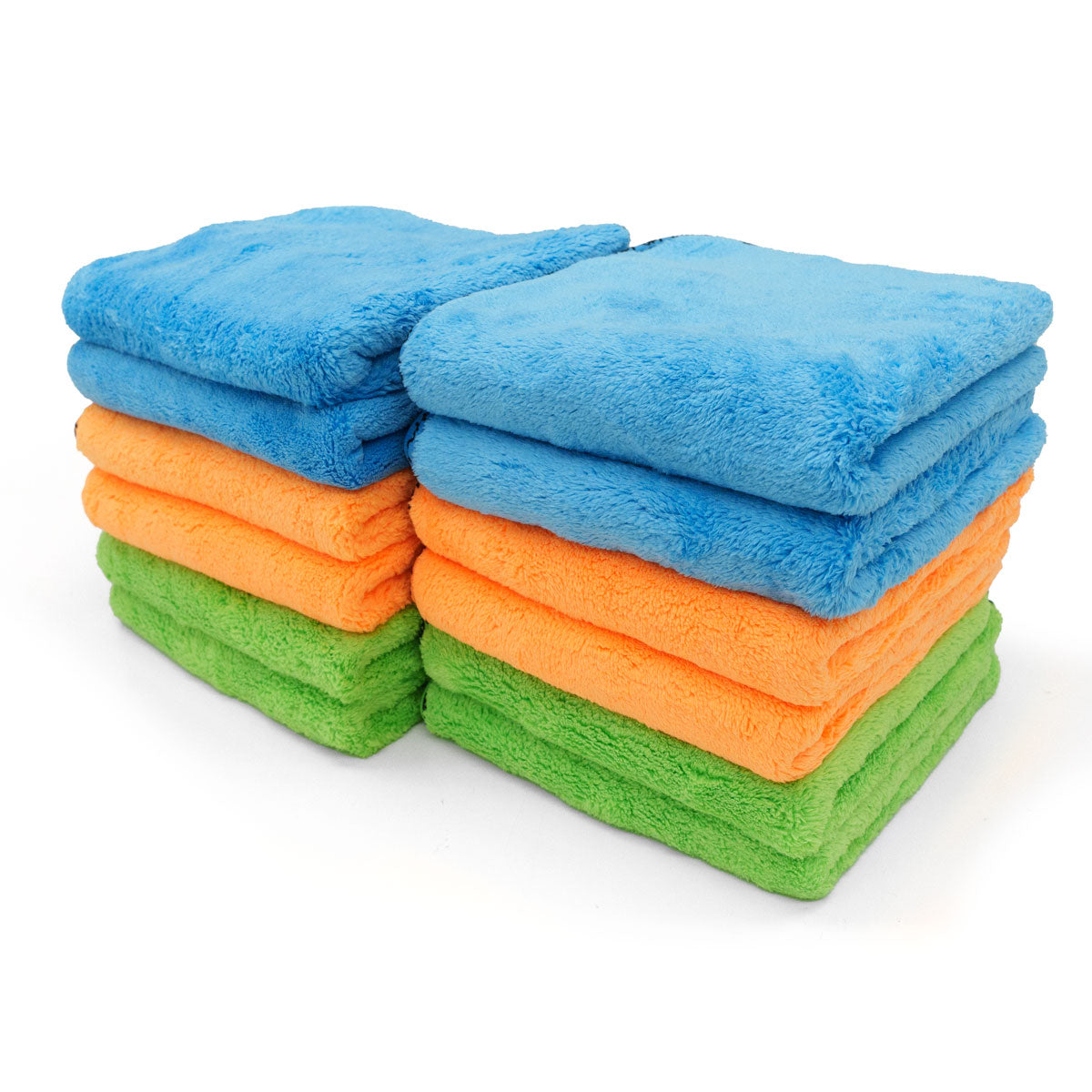 Digital photograph of two neatly stacked piles of fluffy microfiber towels in vibrant blue, orange, and lime green on a plain white background
