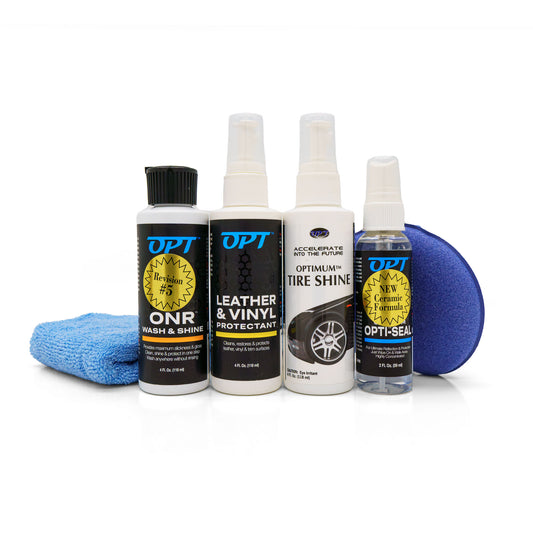 Product photograph featuring four OPT car detailing bottles including ONR Wash & Shine, Leather & Vinyl Protectant, Optimum Tire Shine with a tire graphic, and Opti-Seal New Ceramic Formula with yellow label accents, accompanied by a blue microfiber towel and blue sponge applicator on a clean white background