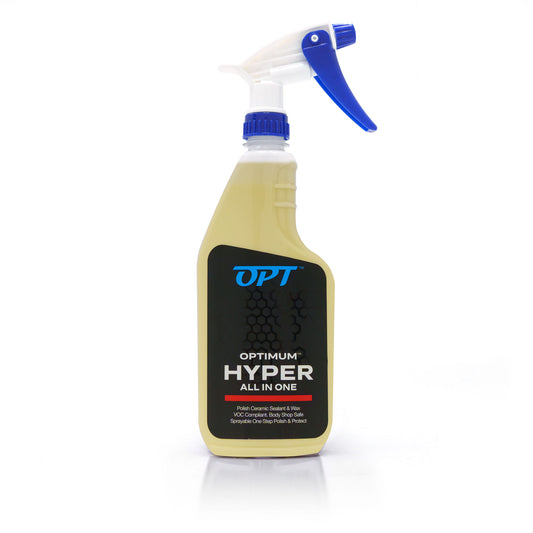 Optimum Hyper All In One car care product bottle on a white background containing a pale yellow liquid with a bright blue trigger sprayer and a black label featuring bold red and blue text