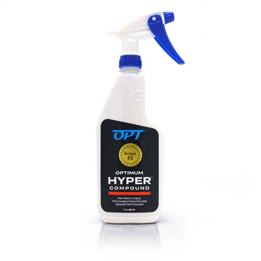A white Optimum Hyper Compound spray bottle with a blue trigger and a black label showing OPT logo Revision #5 paint perfect spray compound