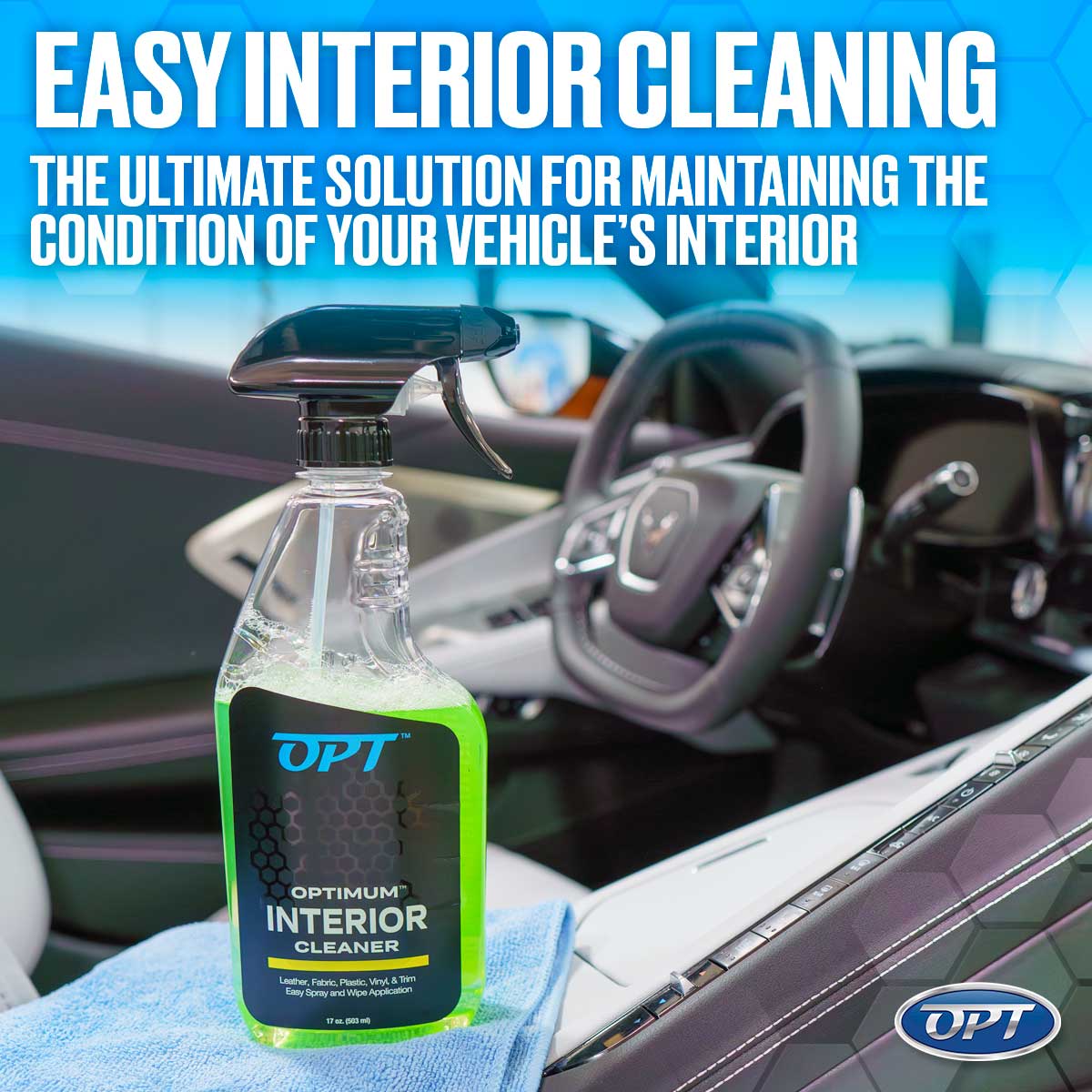 Photograph of an OPT Optimum Interior Cleaner bottle with bright neon green liquid on a blue microfiber cloth in a luxurious car interior, displaying a modern steering wheel with a Corvette emblem and the phrase Easy Interior Cleaning