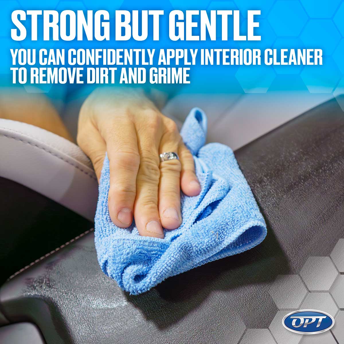 Photograph of a hand with a silver ring cleaning a dark car interior seat using a light blue microfiber cloth, featuring the prominent headline STRONG BUT GENTLE