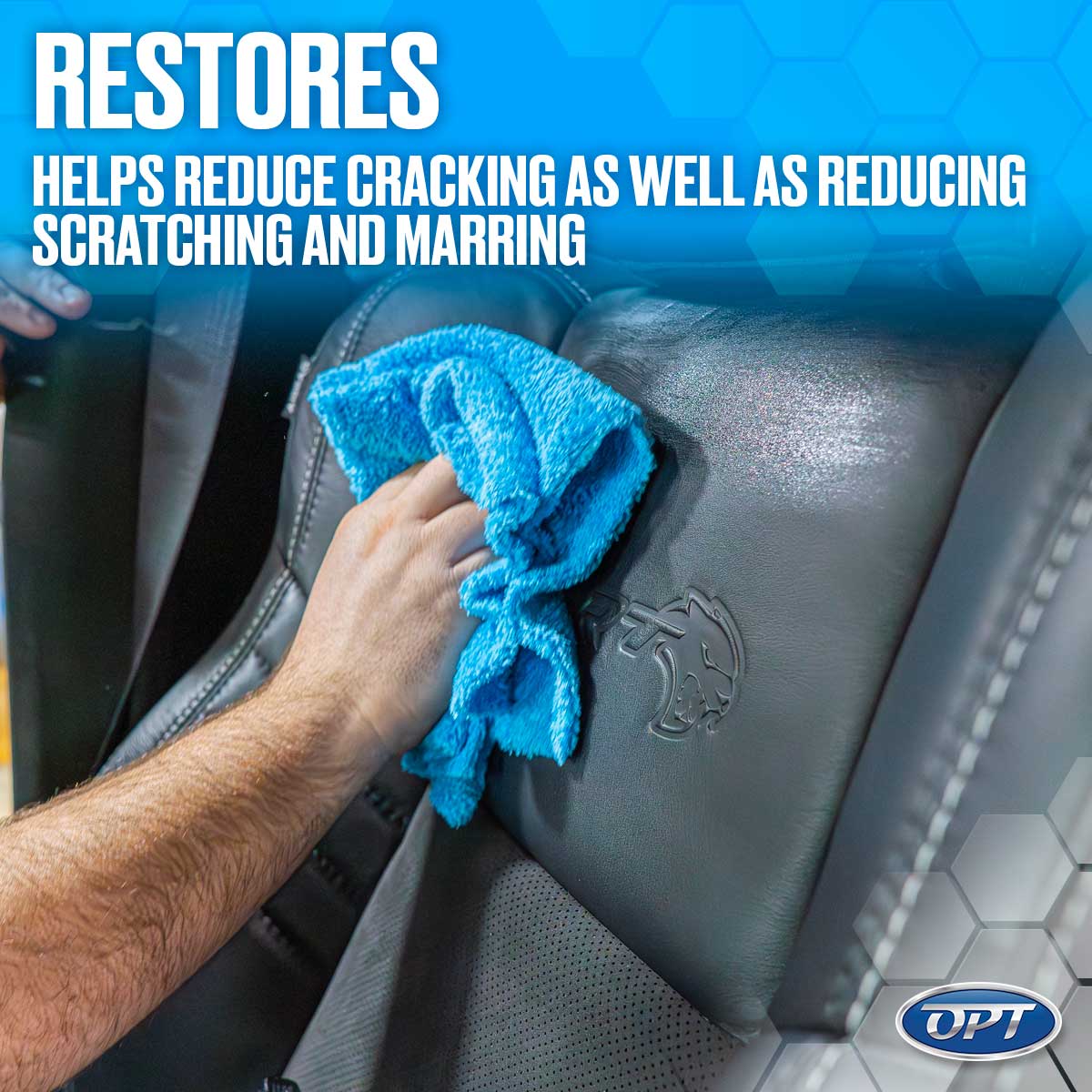 Photograph of a hand using a bright blue microfiber towel to clean a black perforated leather car seat featuring a grey Hellcat logo emblem with overlay text stating RESTORES HELPS REDUCE CRACKING AS WELL AS REDUCING SCRATCHING AND MARRING