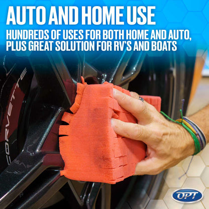 Photograph of a hand holding a vibrant orange grooved sponge cleaning a glossy black Corvette wheel, with colorful friendship bracelets on the wrist