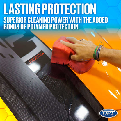 A hand with colorful bracelets applies a red cleaning sponge to a glossy orange and textured black Corvette surface showing the Corvette Racing logo and wet product streaks