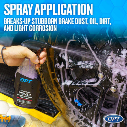 Product photograph showing a hand spraying purple OPT Optimum Power Wheel and Tire Cleaner onto a dirty black car wheel creating rich foam, with overlay text "SPRAY APPLICATION BREAKS-UP STUBBORN BRAKE DUST, OIL, DIRT, AND LIGHT CORROSION"
