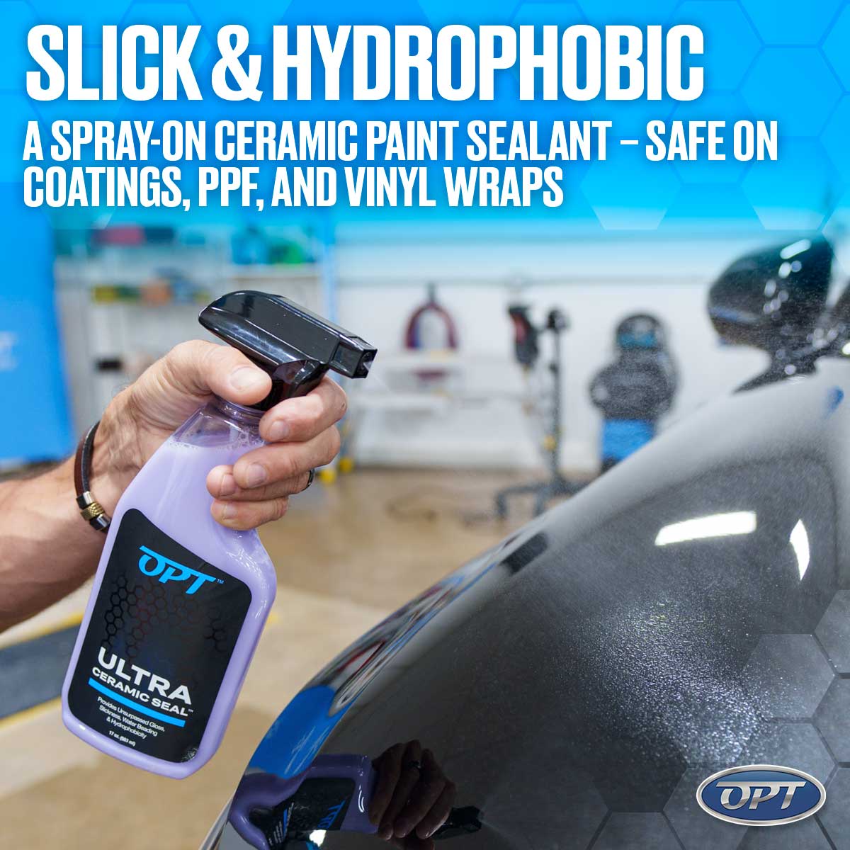 Photograph of a man's hand holding a purple OPT Ultra Ceramic Seal spray bottle, applying a fine mist to a glossy black car surface with a subtle hexagonal texture in a detailing garage, prominently featuring "Slick & Hydrophobic" marketing text