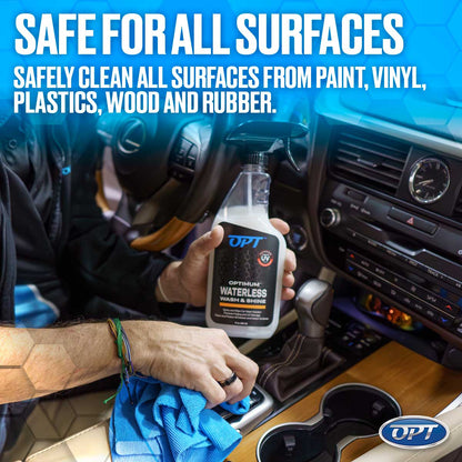 A person holds an Optimum Waterless Wash & Shine spray bottle and blue microfiber cloth, cleaning a car interior with a Lexus steering wheel dashboard and wood trim, advertised as safe for all surfaces