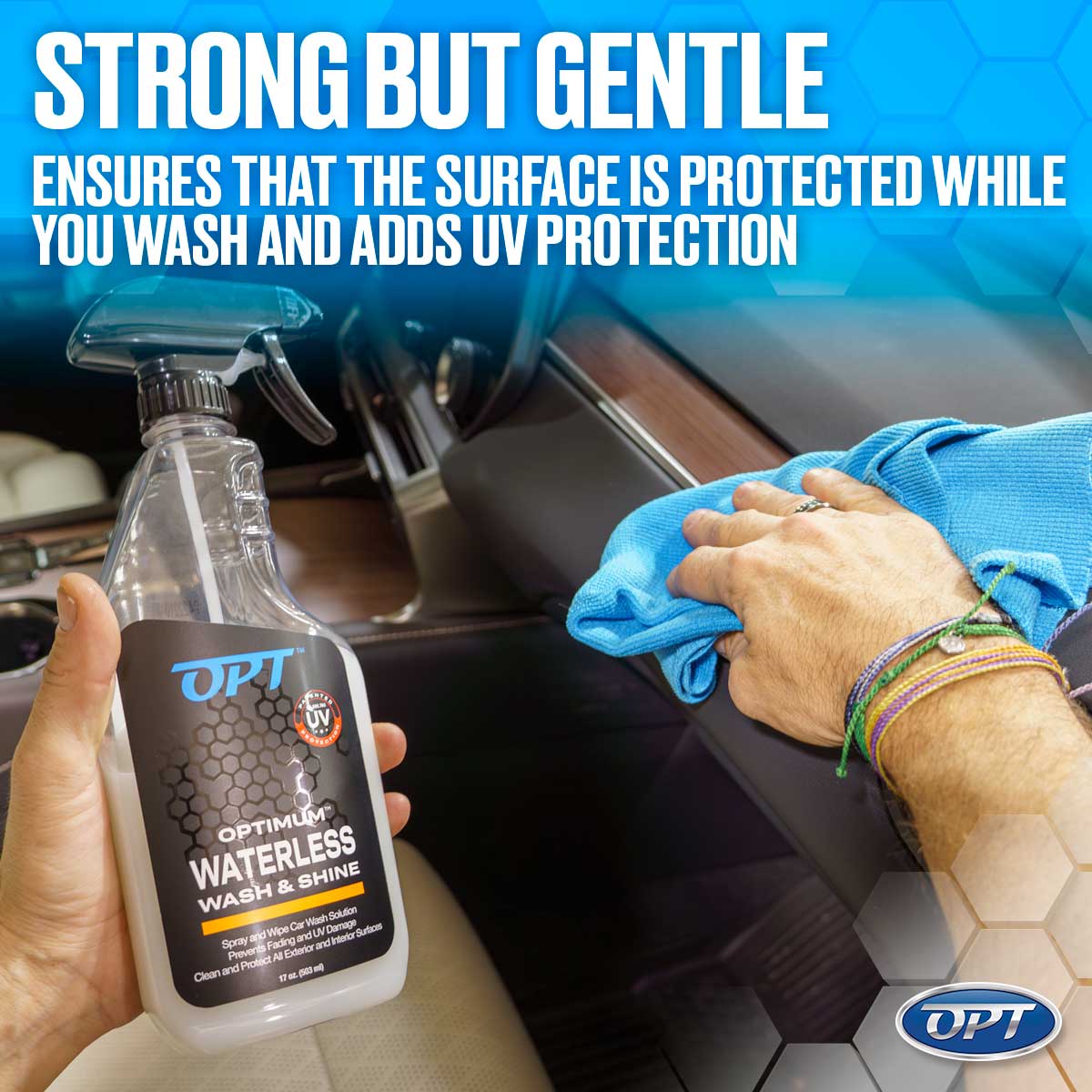 A person's hand holding an OPT Optimum Waterless Wash & Shine spray bottle and wiping a car dashboard with a blue microfiber cloth, showcasing colorful friendship bracelets and promoting the product's strong but gentle UV protection