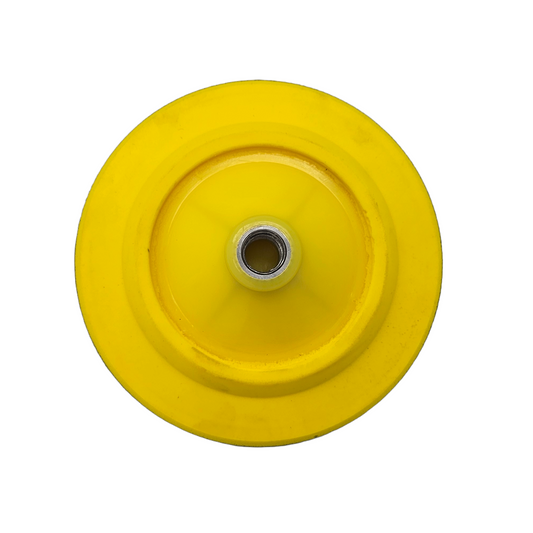 Photograph of a vibrant yellow circular plastic wheel or roller component featuring a central metallic threaded insert and concentric raised bands