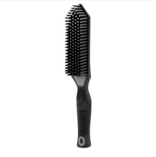 A black rectangular styling brush with dense short bristles and a textured ergonomic handle featuring subtle grey details