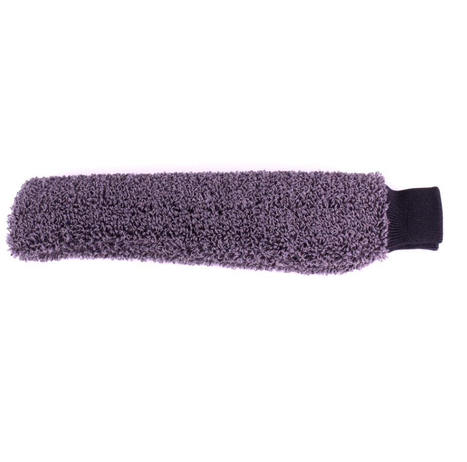 Product photography: A long grey-purple fuzzy tube featuring a dense loop-pile texture and a distinct black ribbed cuff at one end on a white background