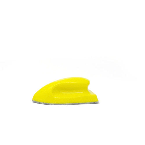 A small bright yellow whiteboard eraser featuring an ergonomic curved design and a grey cleaning pad base against a white backdrop