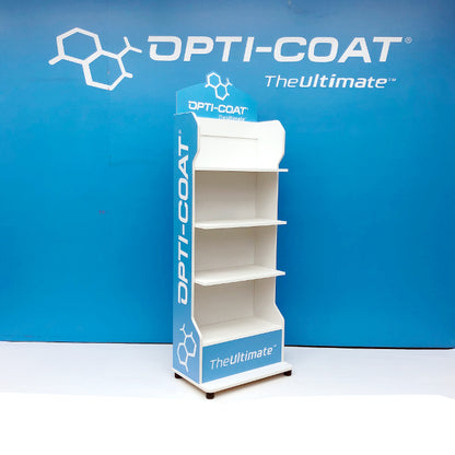 Product photograph of an Opti-Coat branded point-of-sale display shelf featuring four white tiers, white "OPTI-COAT TheUltimate" text and chemical structure logo, set against a bright blue studio wall