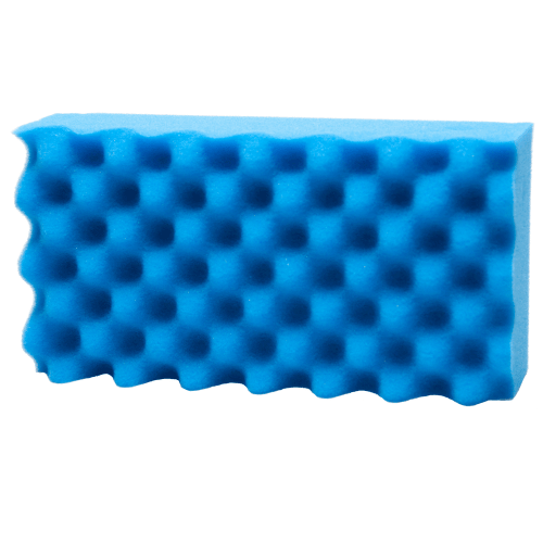 Bright blue rectangular cleaning sponge with a wavy egg-crate textured surface isolated on a white background